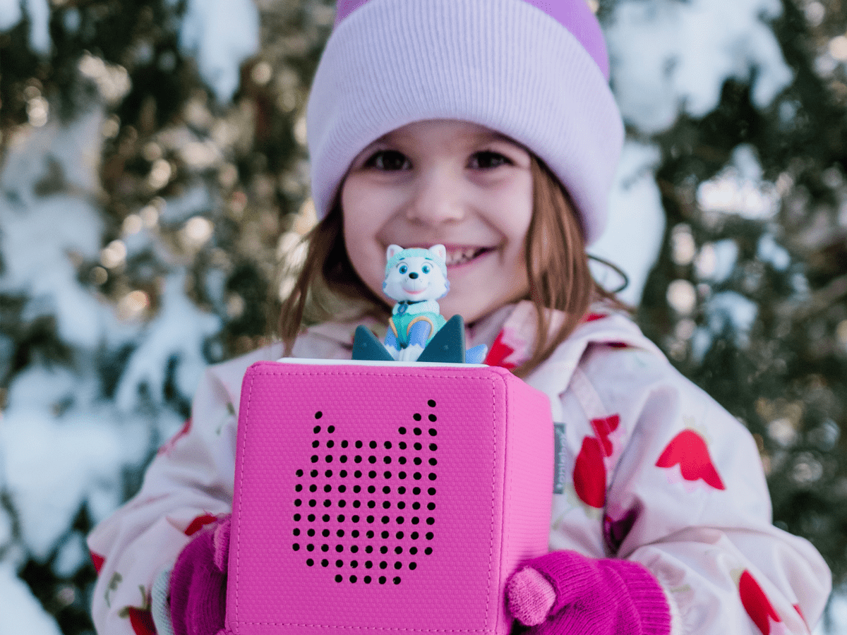 Child Playing With Everest Tonie Audio Figurine And Toniebox 2