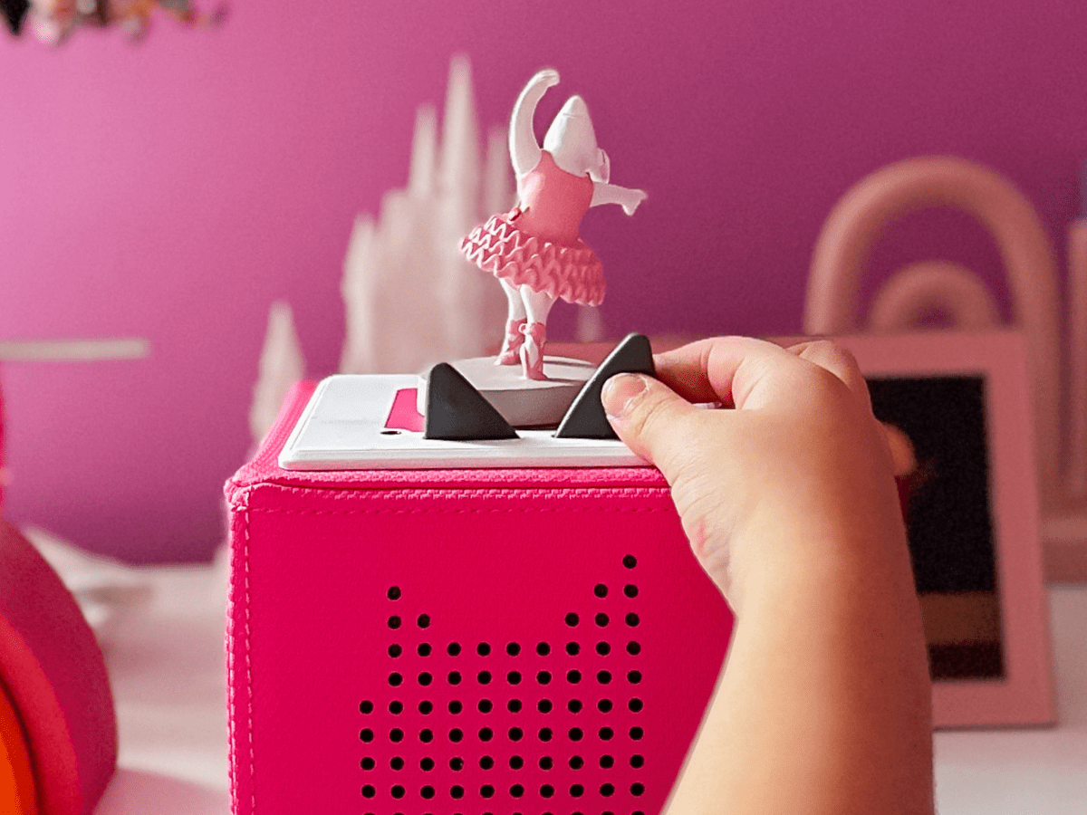 Child playing with Angelina Ballerina Tonie audio figurine and Toniebox 2