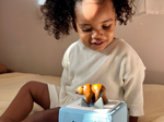 Child Playing With Brown Bear & Friends Tonie