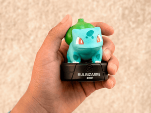 child holding a french pokemon Tonie 