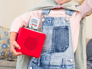 Child Playing With Captain Underpants Tonies Audio Figurine And Toniebox 2