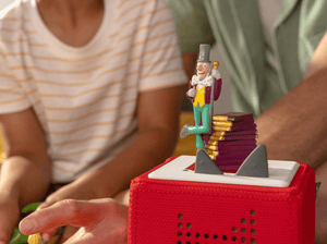 Child Playing With Roald Dahl: Charlie And The Chocolate Factory Tonie