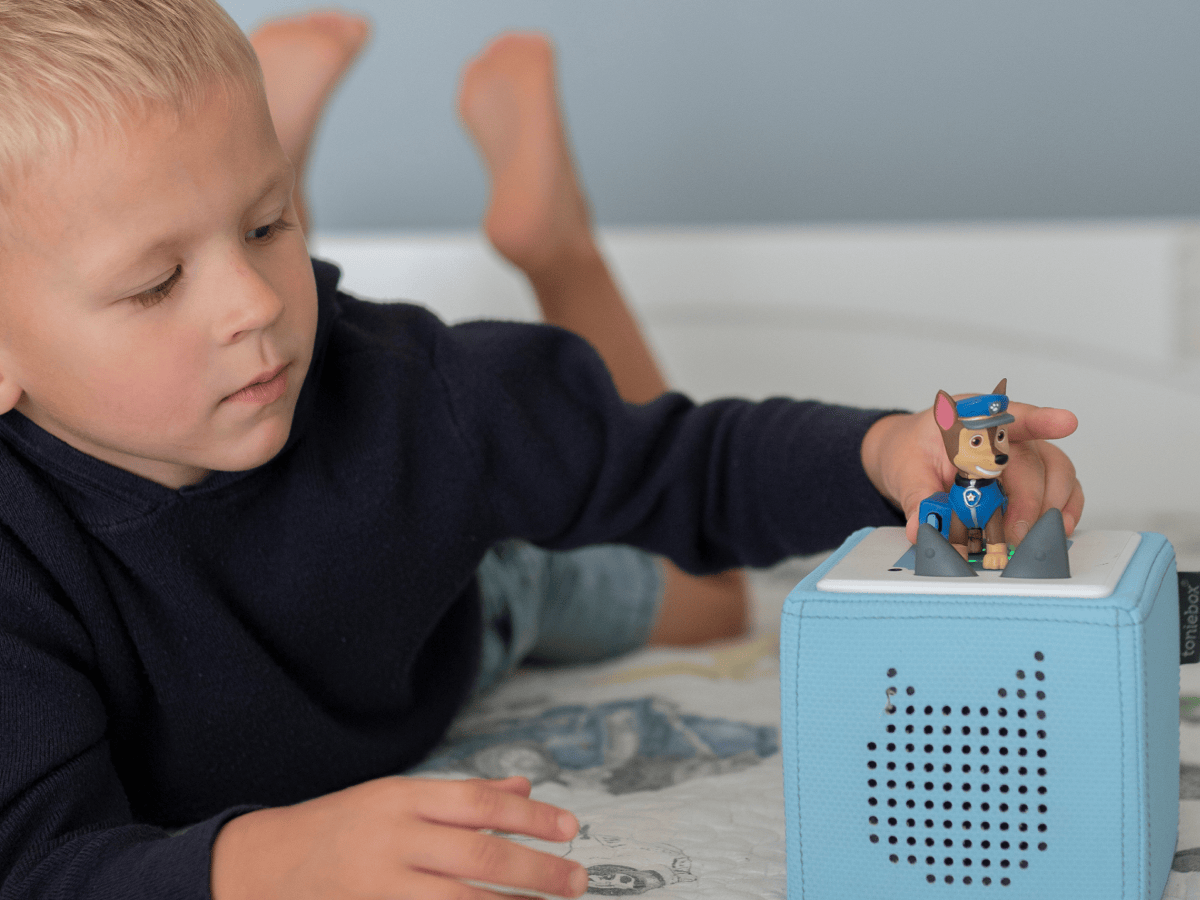 Child Playing With Chase Tonie Audio Figurine And Toniebox 2