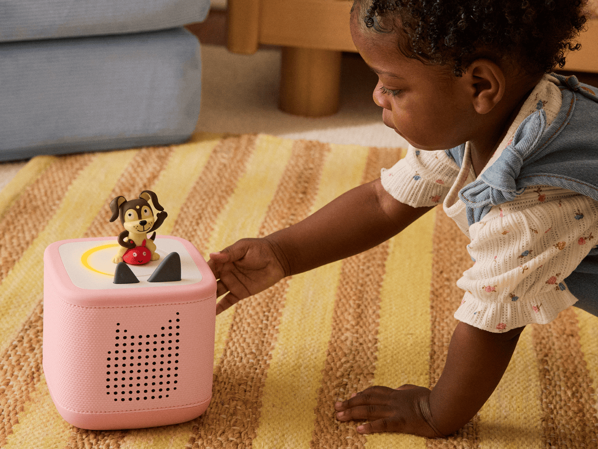 Child Enjoying A Tonie And Toniebox 2, An Audio Player For Kids