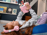 Child Listening To The Toniebox 2 And Tonie With Cloud Pink Bluetooth Headphones For Kids