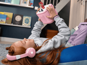 Child Listening To The Toniebox 2 And Tonie With Cloud Pink Bluetooth Headphones For Kids