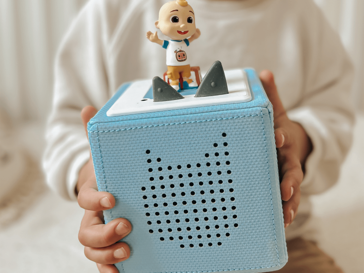 Child Playing With Cocomelon: Sing-Along Favourites Tonie