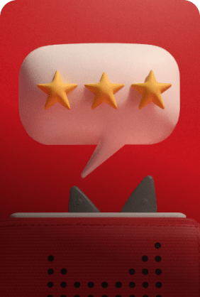 Three gold stars in a white speech bubble above a Toniebox