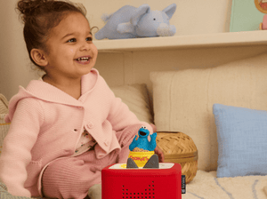 Child Playing With Sesame Street: Cookie Monster Tonie