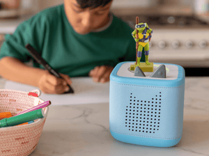 Tales of the Teenage Mutant Ninja Turtles- Donatello Tonie on a blue toniebox 2 with a child coloring in the background