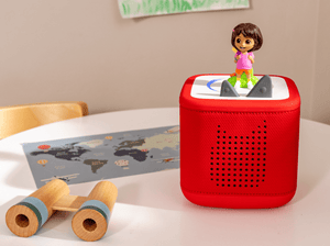 Child Playing With Dora Tonie Audio Figurine And Toniebox 2
