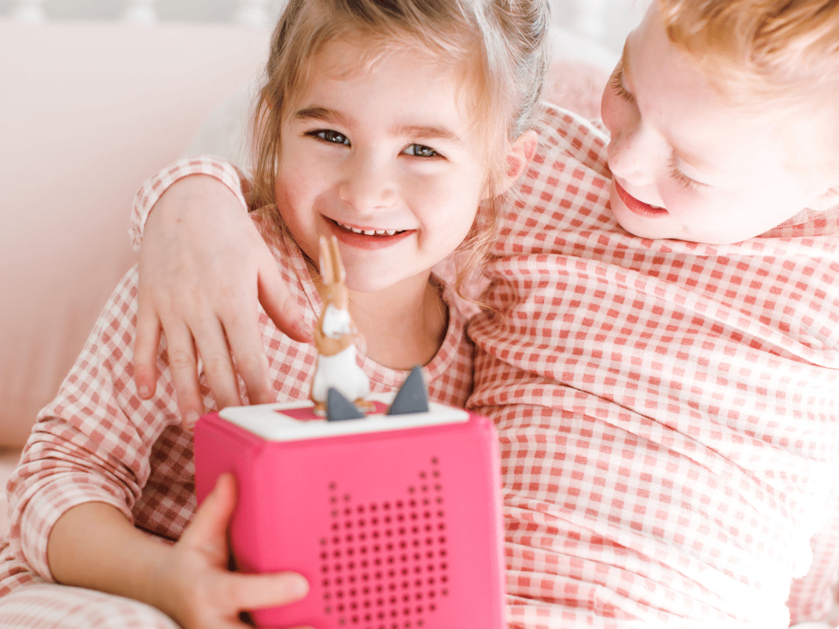 Child Playing With Guess How Much I Love You Tonie