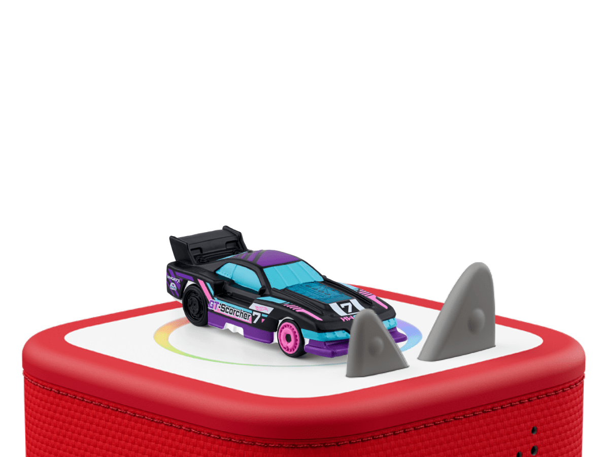 Hot wheels on a red Toniebox 2 ready to play audio stories and songs
