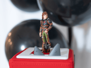 Child Playing With How To Train Your Dragon Tonie