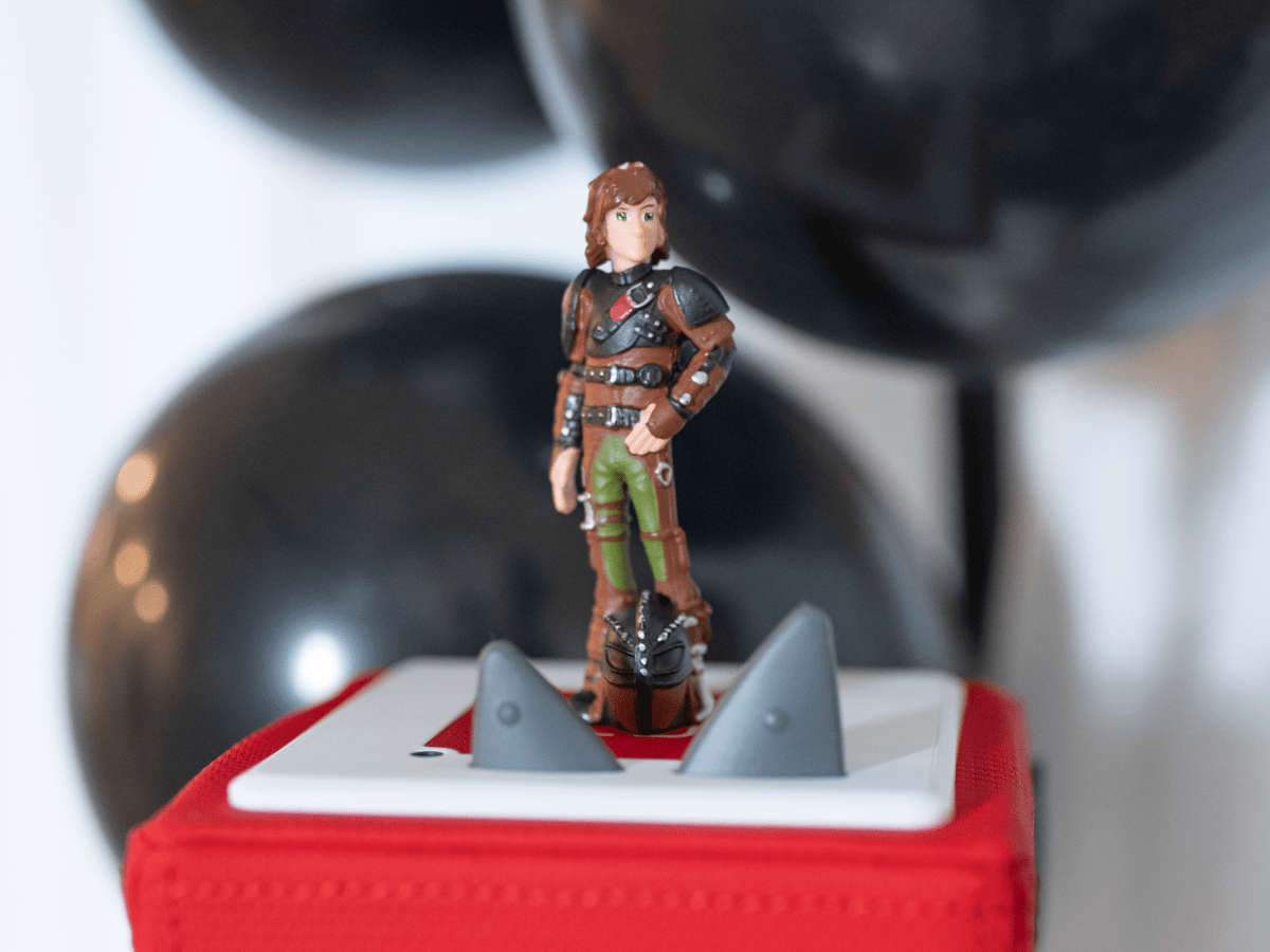 Child Playing With How To Train Your Dragon Tonie