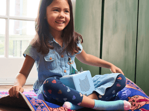 Child Playing With Jasmine Audio Figurine And Toniebox 2