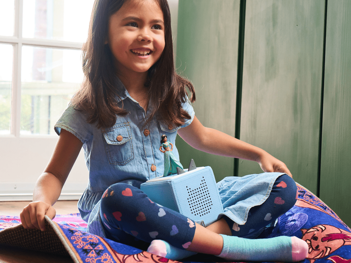 Child Playing With Jasmine Audio Figurine And Toniebox 2