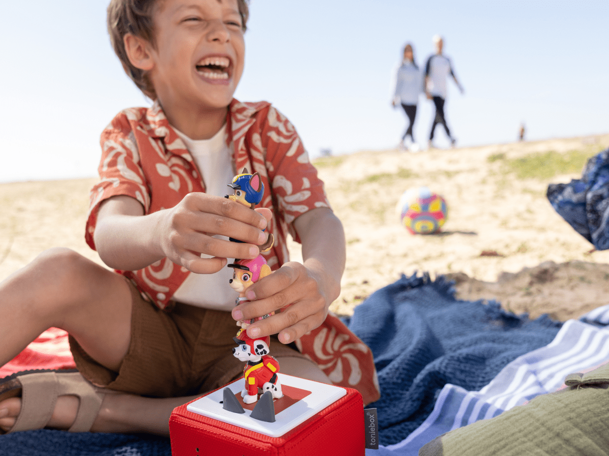 Child Playing With Paw Patrol Jungle Pups: Marshall Tonie