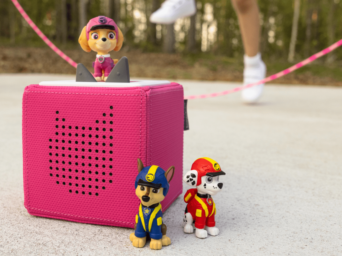 Child Playing With Jungle Pups Skye Tonie  Audio Figurine And Toniebox 2