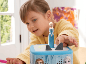 Child Playing With Disney Frozen: Elsa Tonie