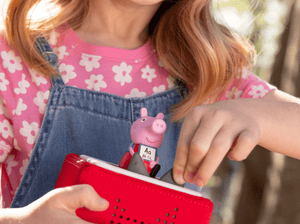 Child Playing With Peppa Pig: Learn With Peppa Tonie