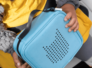 Child Holding Tonies Carrying Case