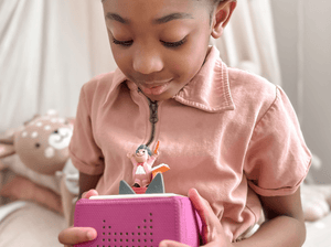 Child Playing With Maestro Tonie