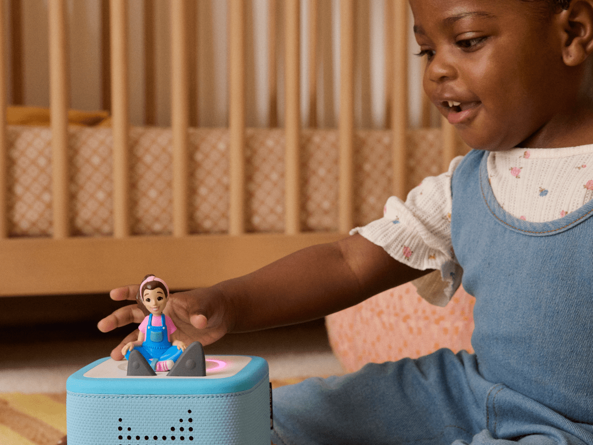 Child Playing With Ms. Rachel Tonie