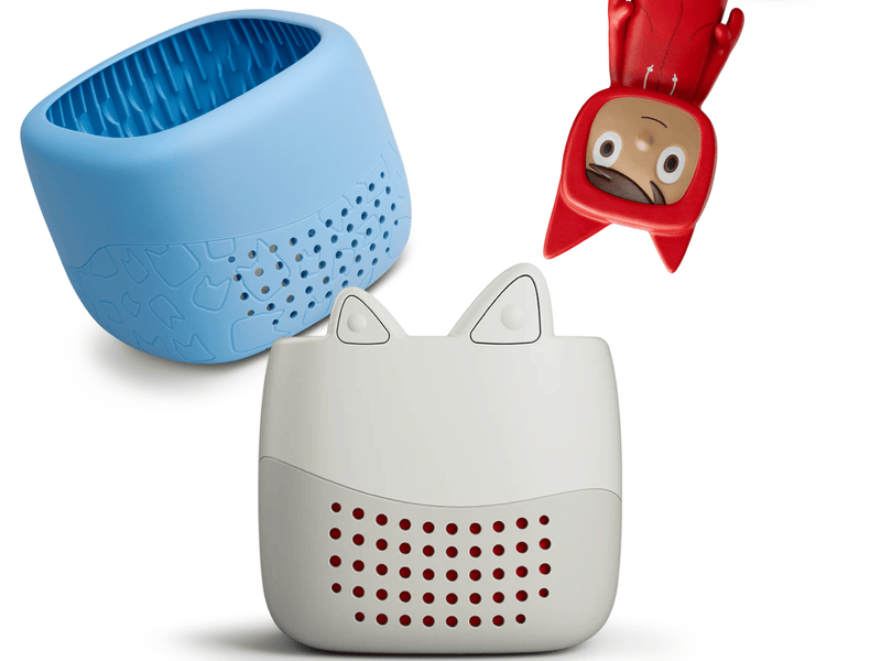 Toniebox Lite, an audio player for kids with Rubie Creative Tonie audio figurine and blue cover | Illustration