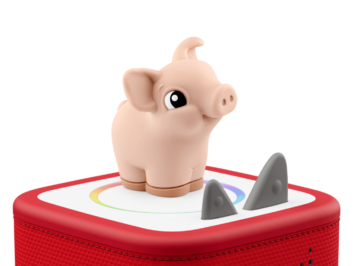 My First Tonies Pig audio figurine for the Toniebox, which plays audio content on a red toniebox