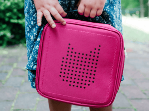 Child Holding Tonies Carrying Case
