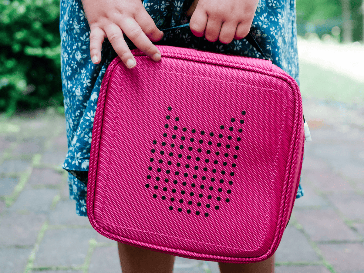 Child Holding Tonies Carrying Case