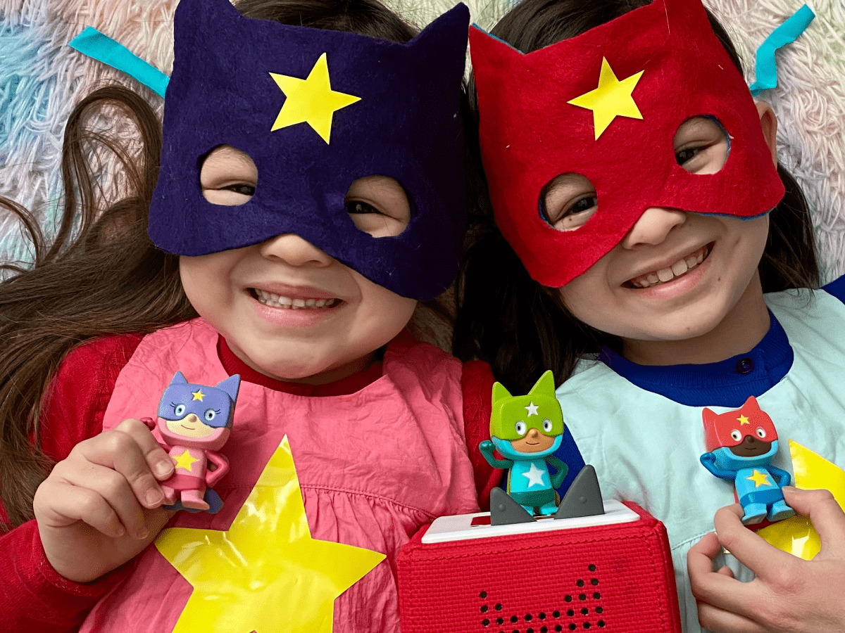 Child Playing With Pink & Purple Superhero Creative-Tonie