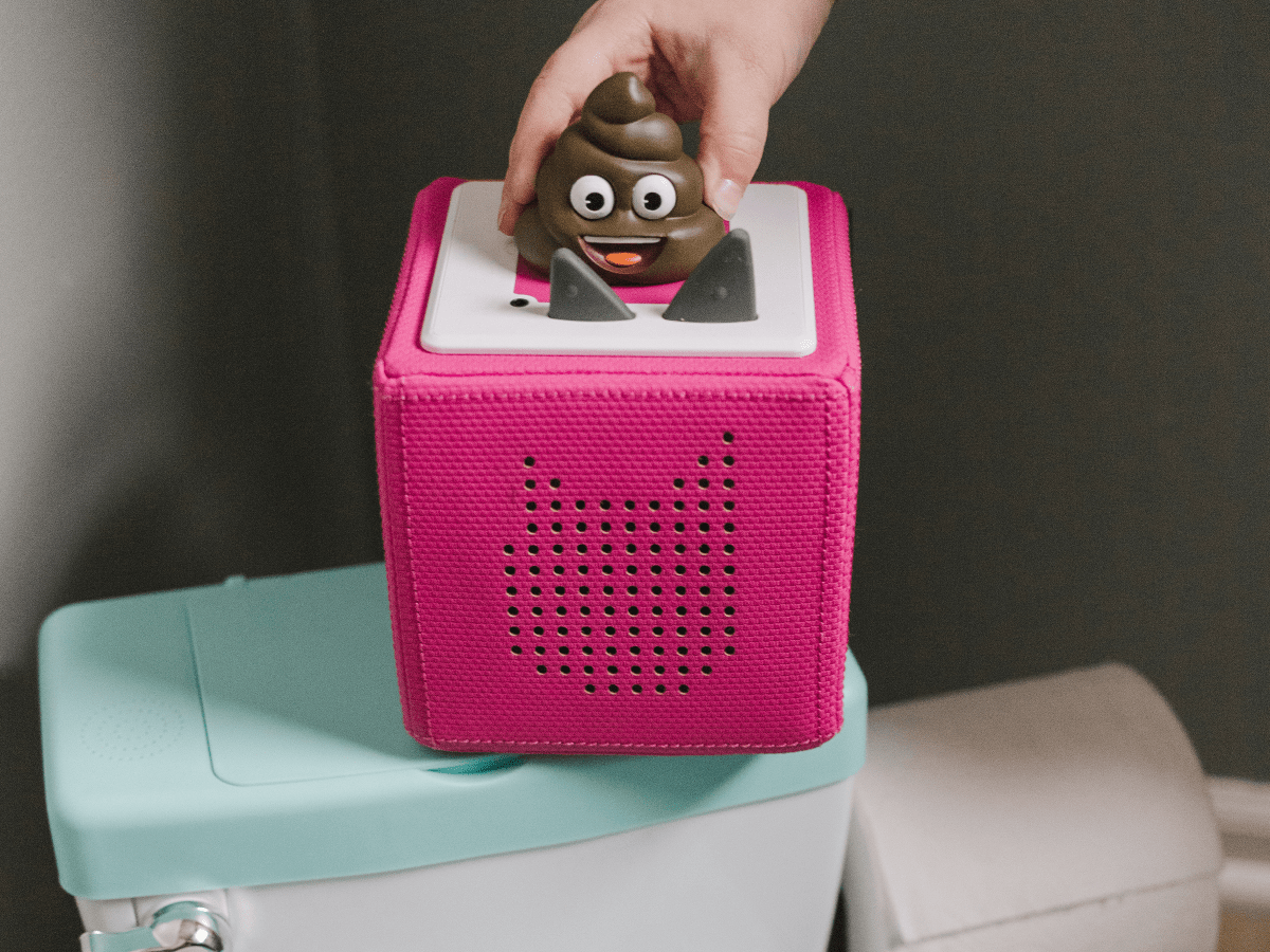 Child Playing With Potty Training Tonie