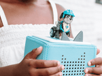 Child Playing With [Rex Tonie Audio Figurine And Toniebox 2