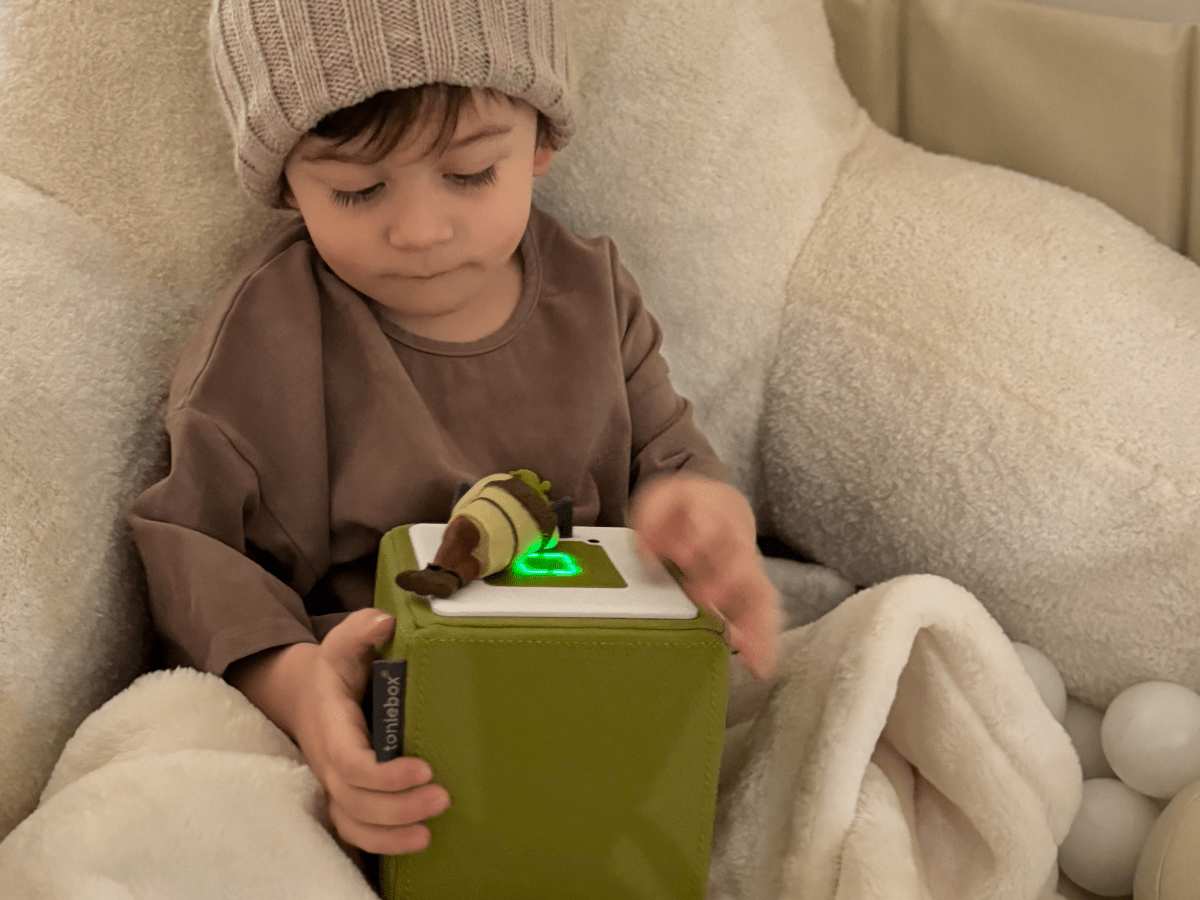 Child Playing With Shrek Tonie