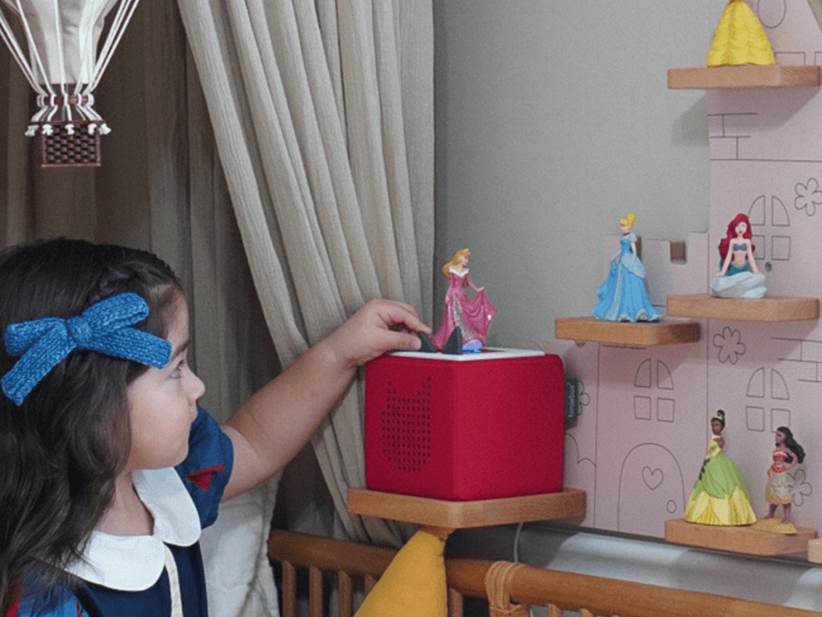 Child Playing With Disney Sleeping Beauty Tonie