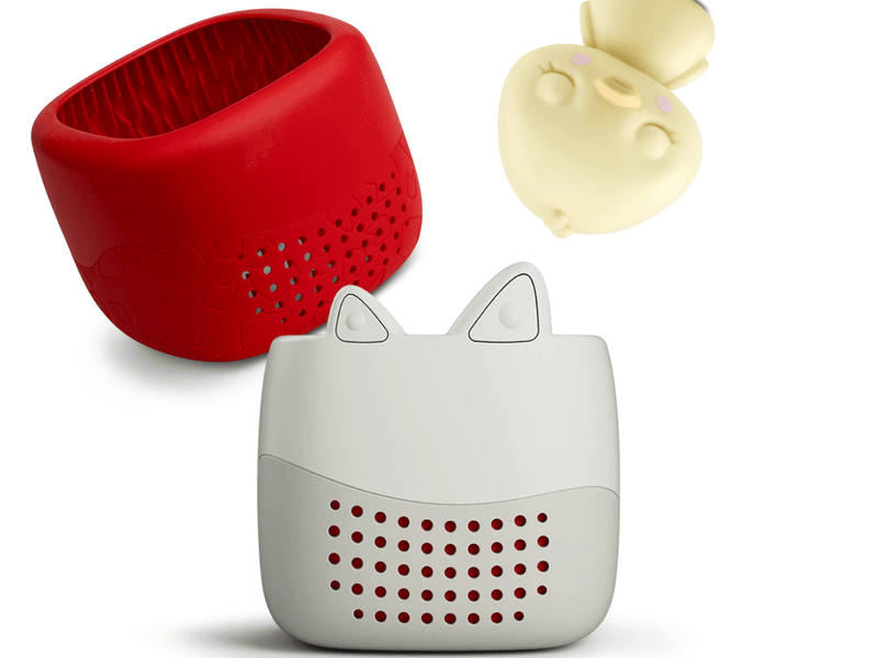 Toniebox Lite, an audio player for kids with Sleepy Duck Tonie audio figurine and red cover | Illustration