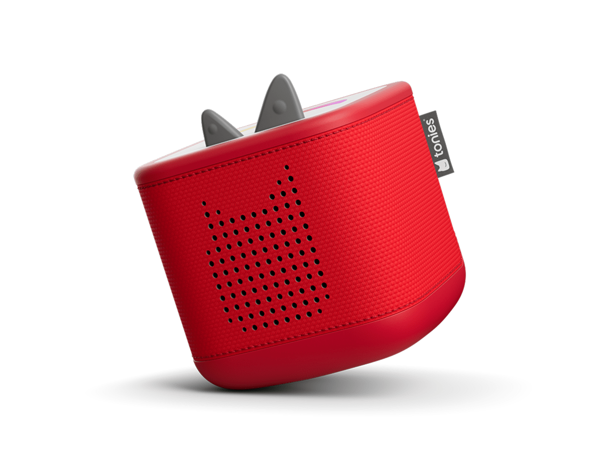 Tilted view of Sunset Red Toniebox 2 an audio player for kids, used with Tonie audio figurines and Tonieplay games