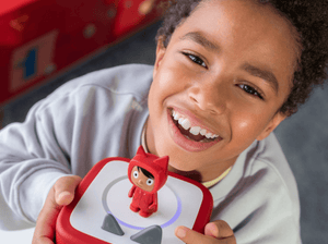 Child Enjoying A Tonie And Toniebox 2, An Audio Player For Kids