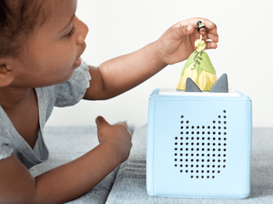 Child Playing With Disney The Princess & The Frog Tonie