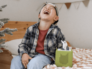 Child Playing With The Snowman & The Snow Dog Tonie
