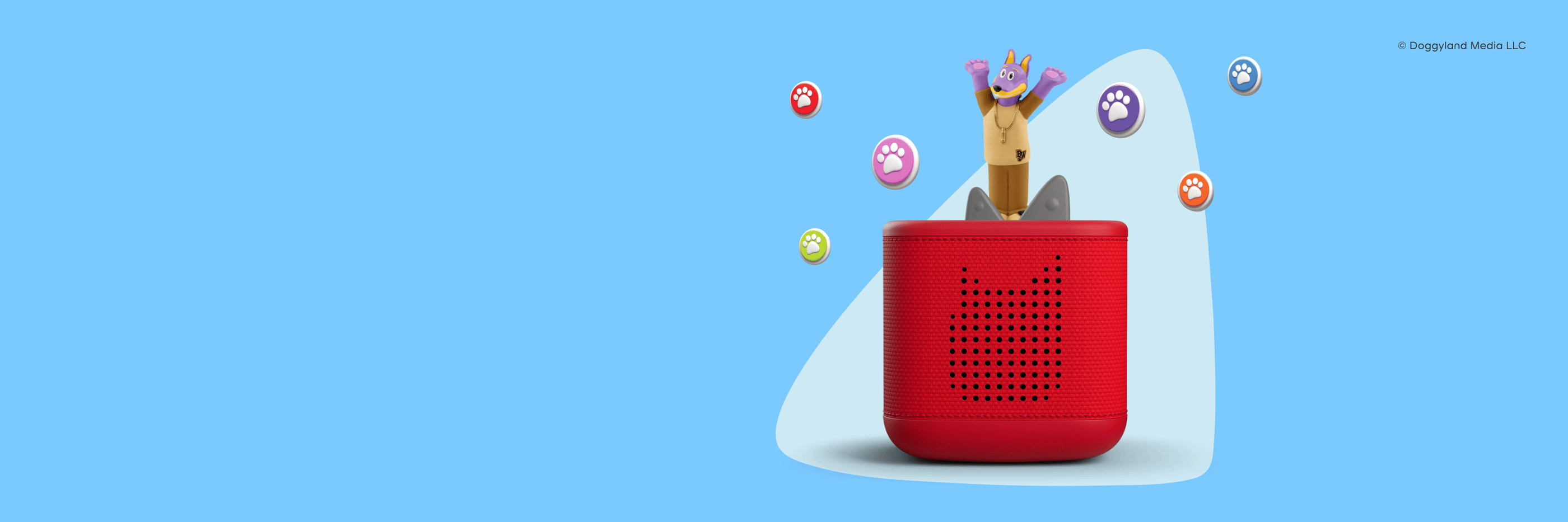 Red Toniebox 2 with a Doggland Tonie on top with paw prints around it