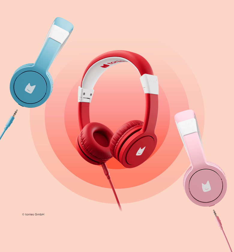 Three pairs of tonies headphones in blue, red, and pink on a peach background