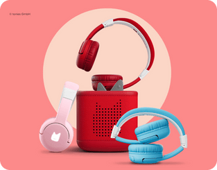pink, blue, and red tonies bluetooth headphones with red Toniebox 2