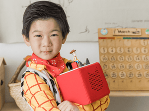 Child Playing With Disney & Pixar Toy Story: Woody Tonie